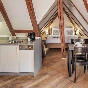 Studio met een Queen Size Bed in de Zolder